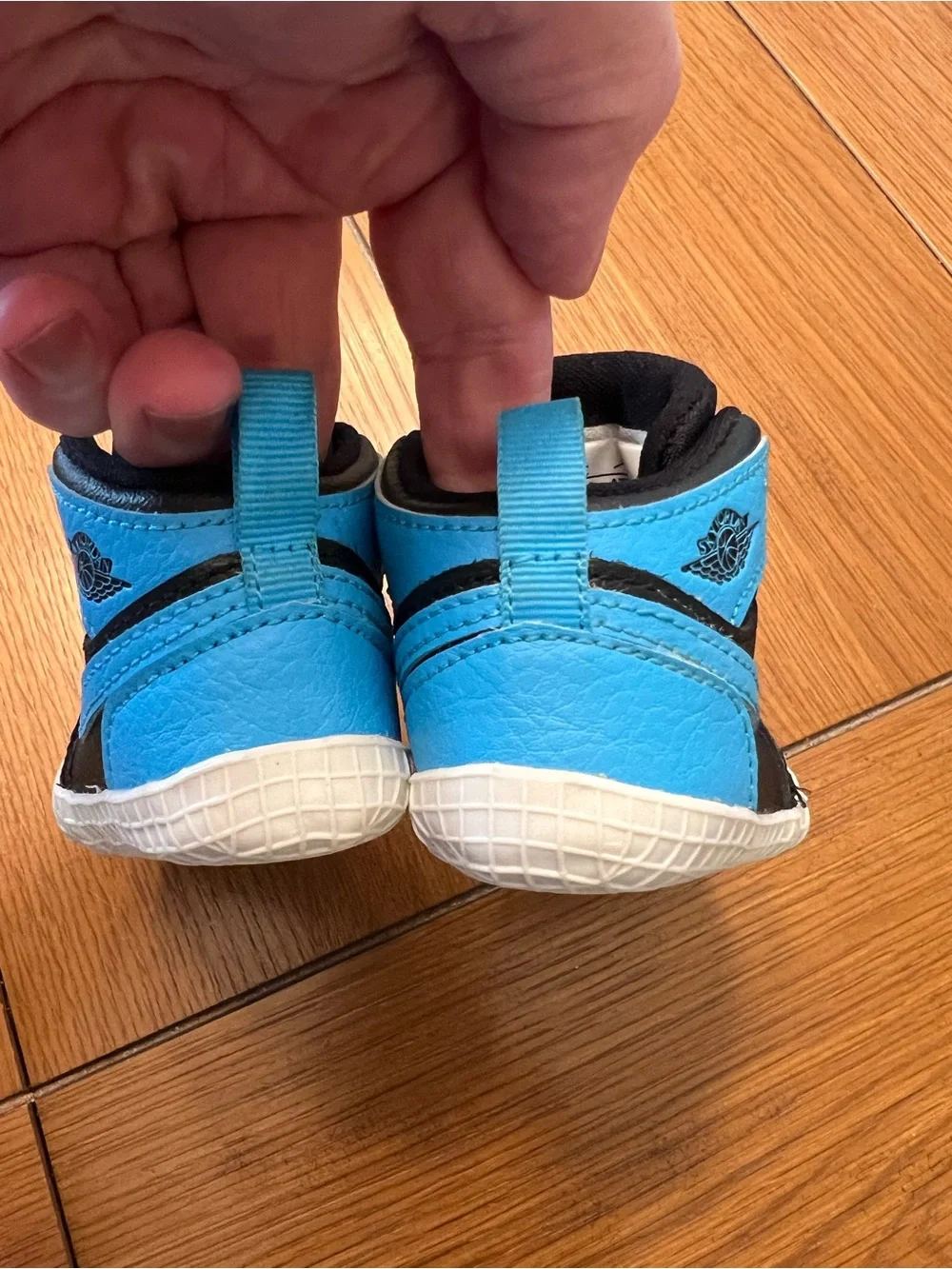 Nike Kids Black High-Top Sneakers with Blue and Red Accents